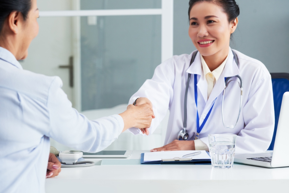 Doctor and patient handshake